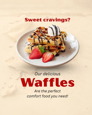 A plate of waffles with strawberries and whipped cream