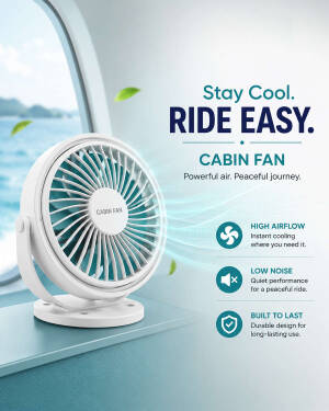 A white portable cabin fan sitting on a blue surface with an ocean window background and text overlay about cooling features.