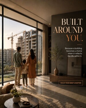 A family of three standing by a large window overlooking a residential construction site, inside a modern, warm-toned living room.