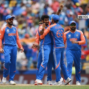 Indian cricketers celebrating a wicket during a match