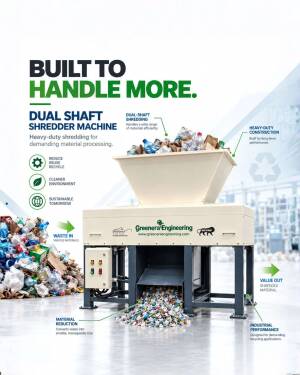 A heavy-duty dual shaft shredder machine used for processing industrial waste and recycling materials.