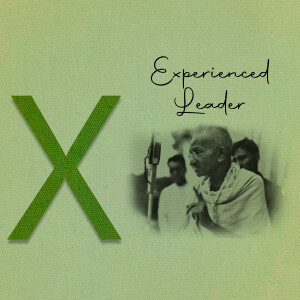 Image featuring a large green 'X' with a faded portrait of Mahatma Gandhi speaking at a microphone.
