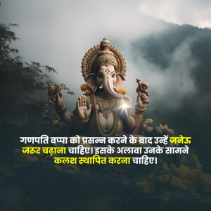 Close-up of Lord Ganesha statue with text in Hindi