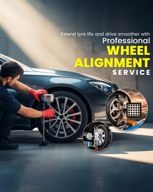 Mechanic performing wheel alignment on a car