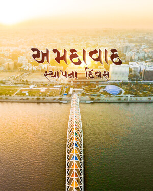 Aerial view of Ahmedabad city with the Sabarmati Riverfront and a distinctive tower structure.
